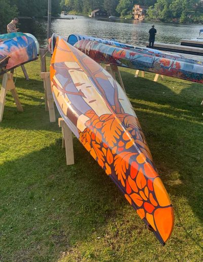 Painted canoe displayed in park